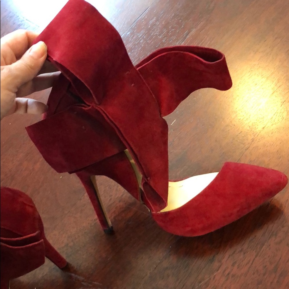 Like new pair of red Amina Abdul high heels